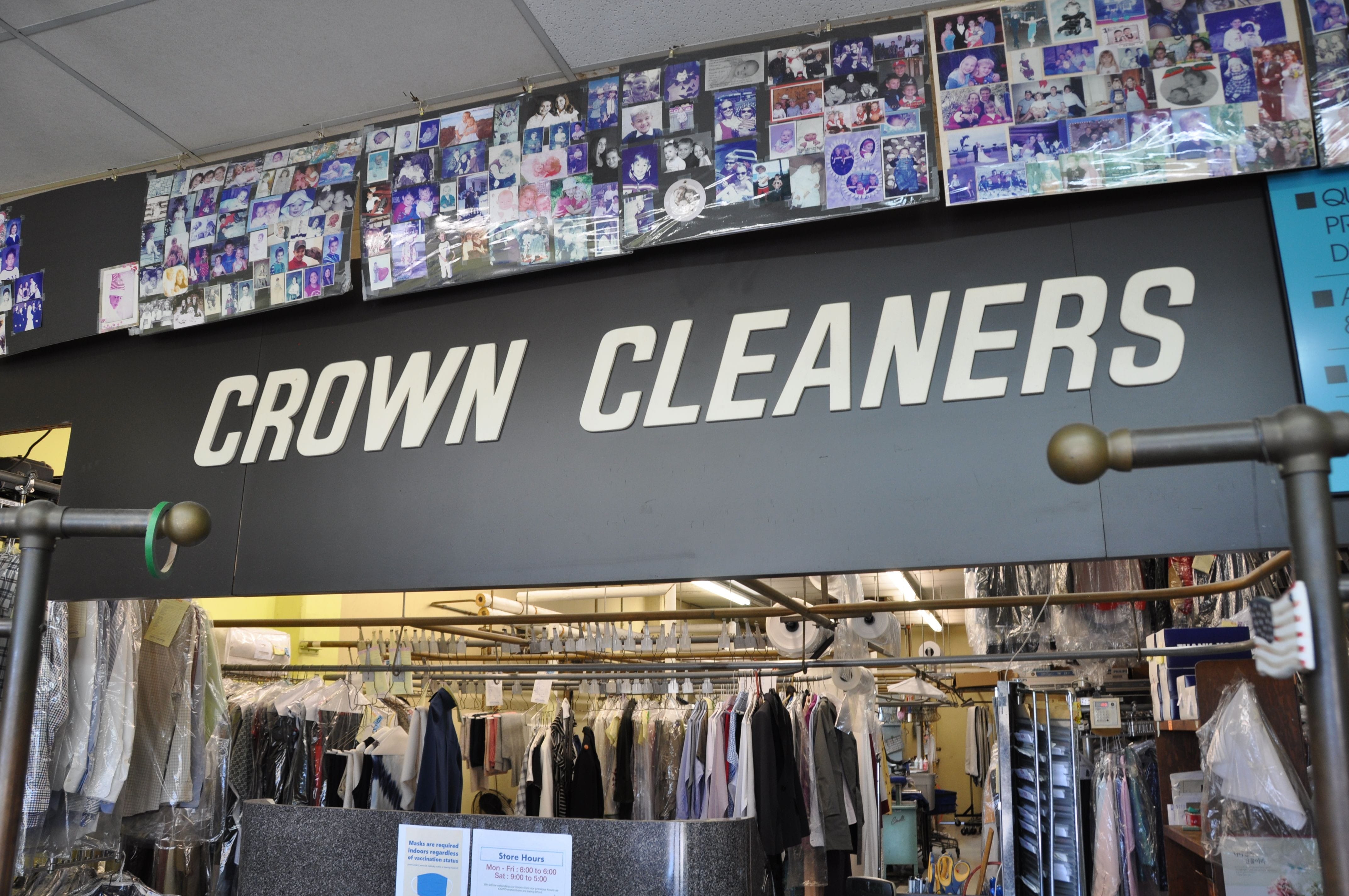 A photo showing the interior sign at Crown Cleaners.